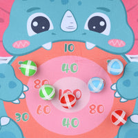 Close-up of sticky ball stuck to dinosaur target board face