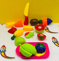 Kids pretend play fruit cutting set close-up