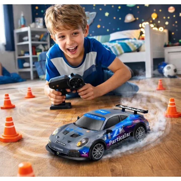 Boy playing with the RC Drift Car in blue, racing around traffic cones indoors